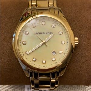 Gold tone Michael Kors watch